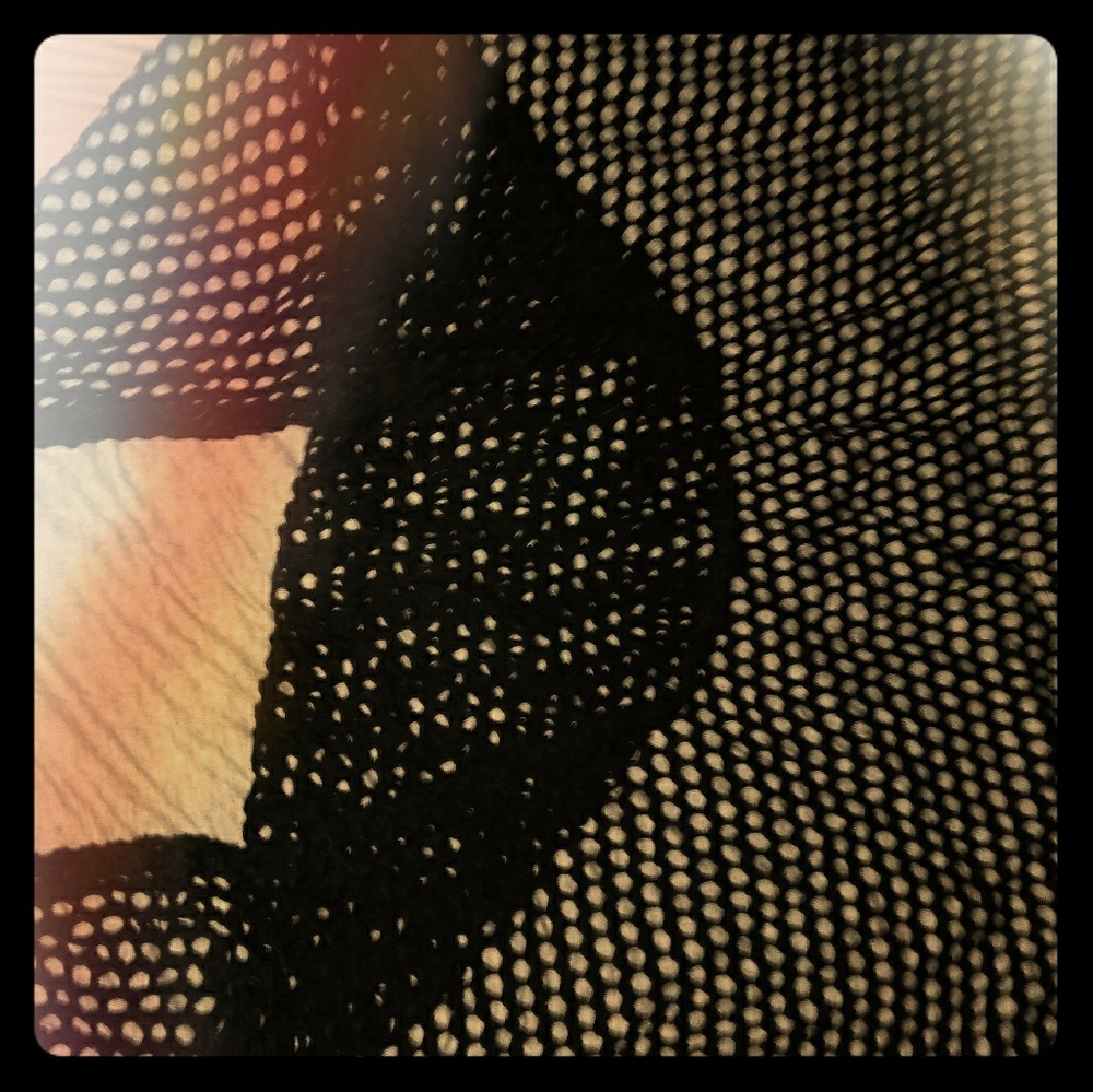 Gray jersey skirt with fishnet overlay